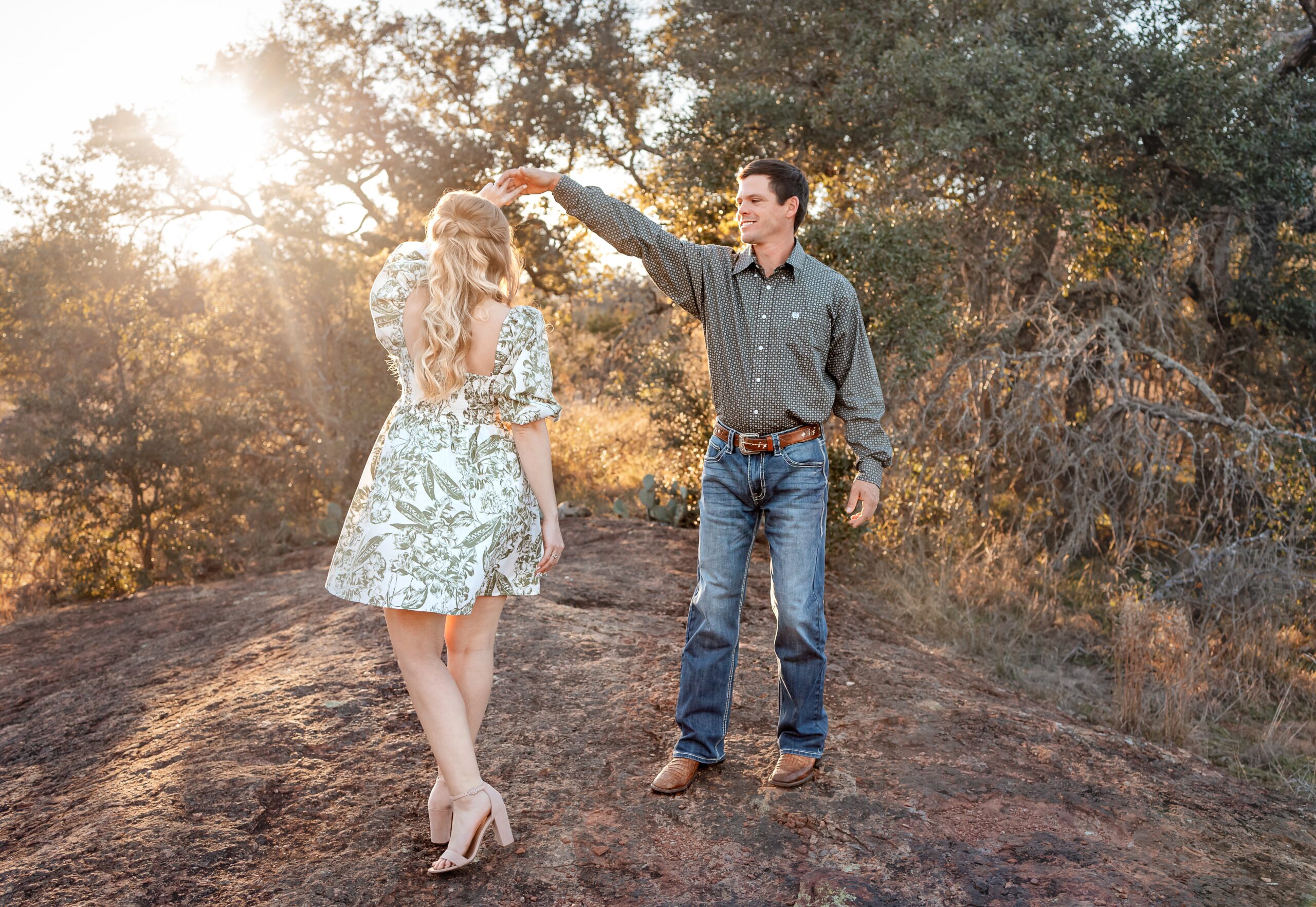enchanted rock engagement session couple twirling